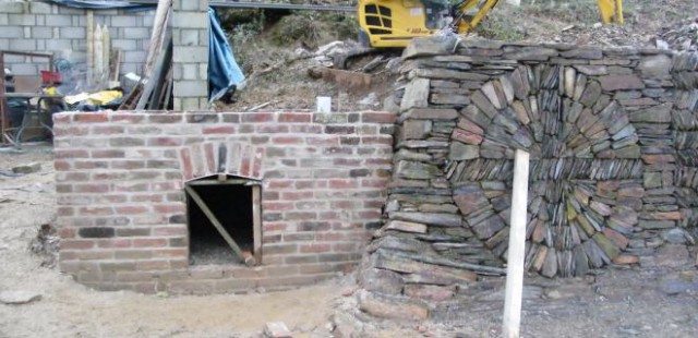 Progress of Pizza oven - work continues using reclaimed bricks